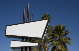 Quintessential Palm Springs -- a blank, white and black modernist sign in front of palm trees and a clear blue sky.  (Quintessential Palm Springs -- a blank, white and black modernist sign in front of palm trees and a clear blue sky. , ASCII, 117 comp